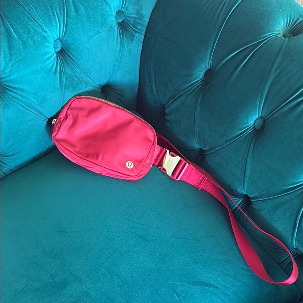 Lululemon Athletica Red Everywhere Bag with gold clip